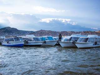 Visit Uros floating islands and departure to Copacabana (Bolivia)